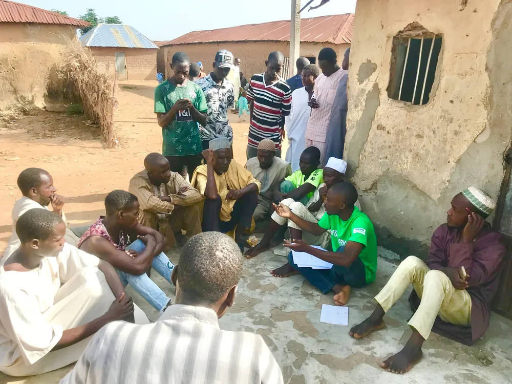 CAL project facilitators meeting with community members