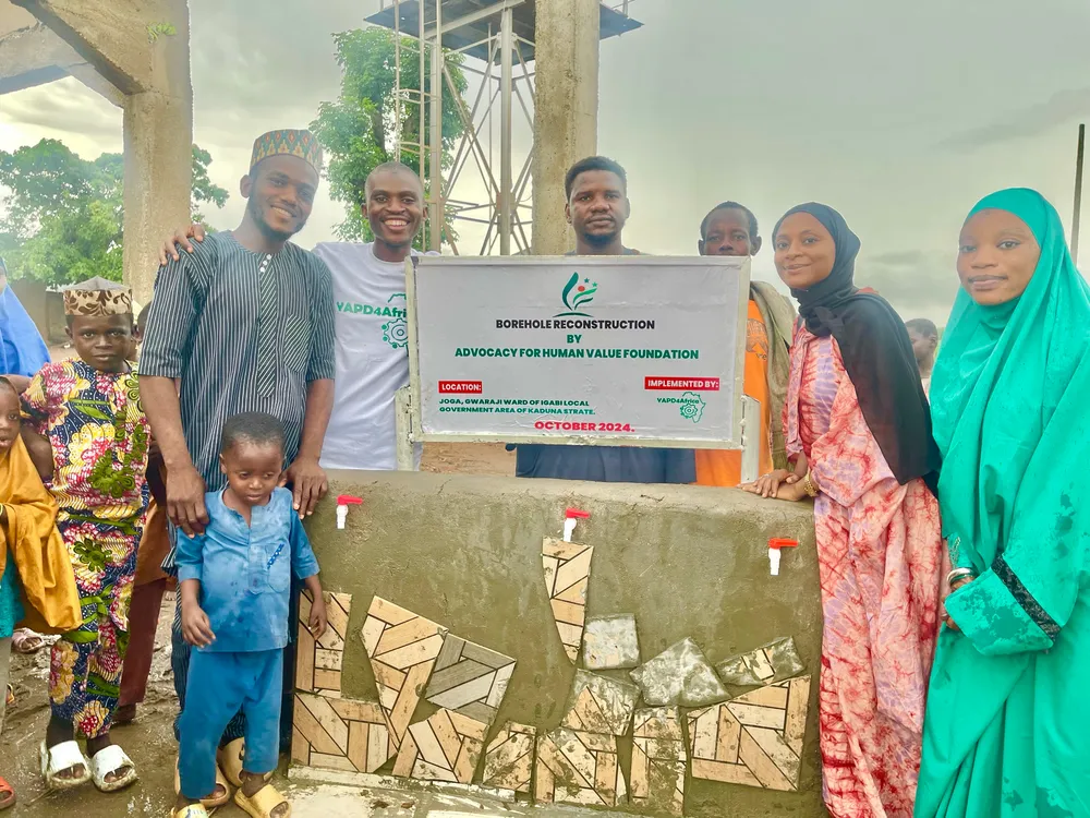 Community members in front of the reconstructed borehole in Joga Sabon Gari